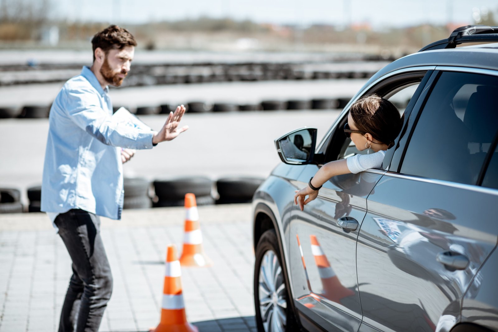 instructor teaching to drive a car on the training 2023 11 27 05 07 26 utc 1 scaled